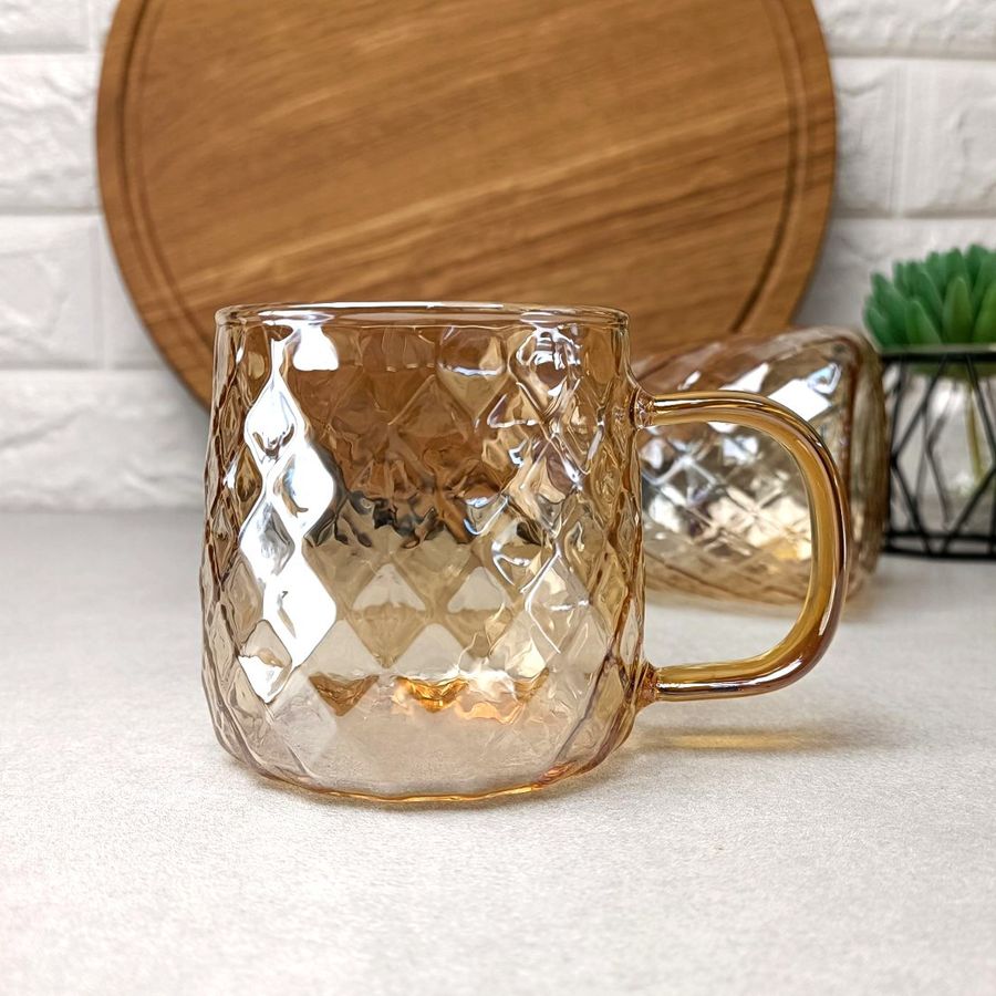 Чайна чашка із золотистим перламутром Amber з боросилікатного скла Crystal Hell
