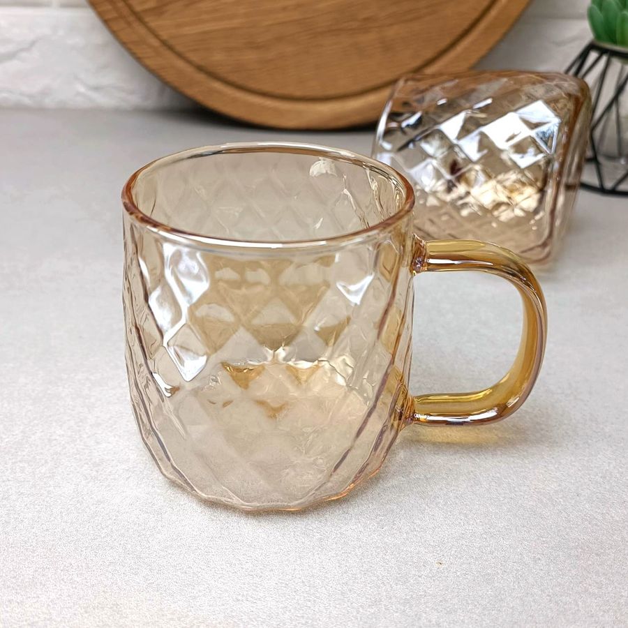 Чайна чашка із золотистим перламутром Amber з боросилікатного скла Crystal Hell