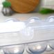 Пластиковий лоток для зберігання та транспортування яєць на 12 осередків.