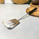 Лопатка кухонна металева з прорізами 32 см Чорна Рукоять