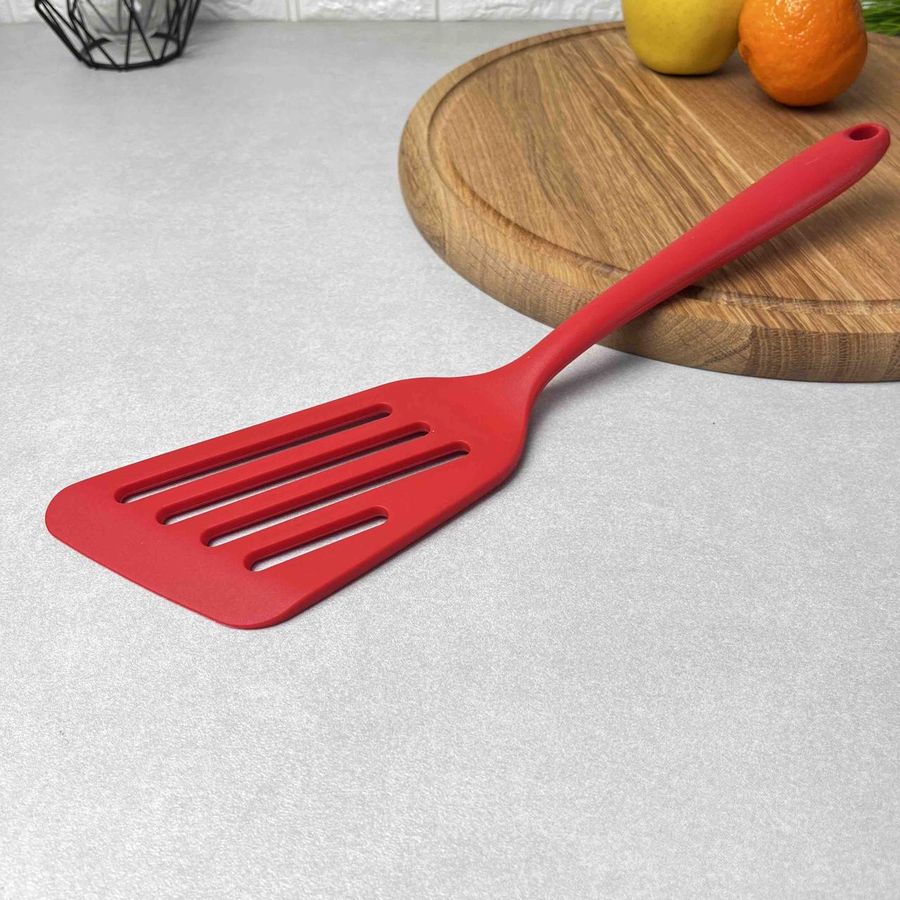 Красная силиконовая кухонная лопатка с прорезями Hell